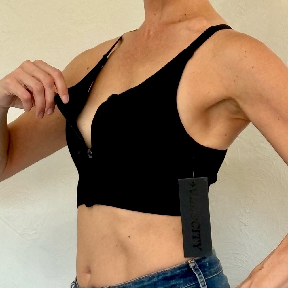 COMFY & EASY, black racer-back sports bra with zipper front and removable pads